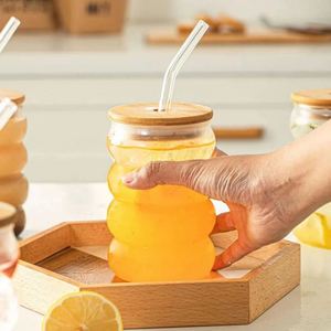 Tasse en verre borosilicaté OEM ODM vente en gros tasse à café lait thé cercle simple avec couvercle verre ondulé en spirale - Product Image 2