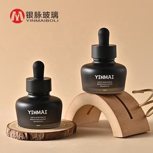 ขวดหยดแก้วสำหรับน้ำมันหอมระเหยหรือเซรั่ม ยี่ห้อ Luxury Yinmai Cosmetic ขนาด 30 มล. 1 ออนซ์ สีดำ พร้อมหลอดหยดสีดำ - Product Image 1
