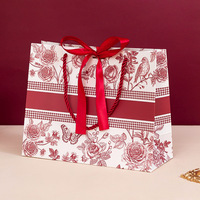 Sacs cadeaux en papier de luxe de haute qualité, logo imprimé personnalisé, sacs de shopping légers et luxueux pour les vêtements, emballage pour les boutiques de détail