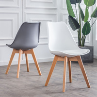 Chaise de salle à manger de bureau en plastique tulipe rembourrée sans bras en bois massif de style nordique