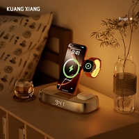 KUANGXIANG 2026 Desktop Gadgets 5-in-1 opvouwbare snelle draadloze oplaadluidspreker met dubbele wekkers, nachtlampje, telefoonstandaard