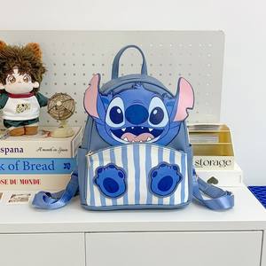 Sac à dos de dessin animé petit monstre en gros transfrontalier pour étudiantes, sac mignon, sac à dos de poupée en peluche bleue de grande capacité - Product Image 6