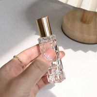 Flacon de parfum en verre transparent de luxe de 10 ml, forme élégante, effet ondulé, vaporisateur à bille pour crème pour le visage, mascara, compte-gouttes pour les yeux