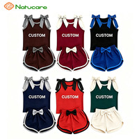 Ensemble de vêtements pour enfants : Haut sans manches à nœuds aux épaules et short de sport pour bébés filles, thème équipe de football, collection été, style boutique