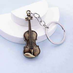 Llavero de metal vintage con guitarra y violín, accesorio colgante creativo y personalizado - Product Image 2