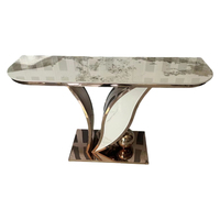 Table à manger minimaliste italienne moderne de luxe, structure en acier inoxydable de qualité supérieure, plateau en pierre frittée écologique, salle à manger d'hôtel