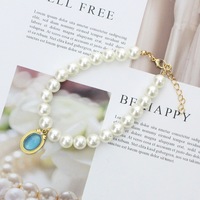 Collier pour animaux de compagnie, chat, chien, imitation perle, pendentif émeraude, style féminin, accessoires de mode pour animaux, toutes saisons, anniversaire