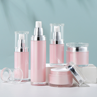 Pot de crème d'emballage de cosmétiques de soins de la peau rose de luxe à impression personnalisée Lotion ensembles de flacons cosmétiques en plastique acrylique