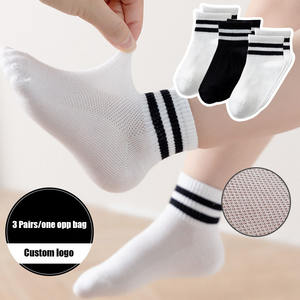 <span class=keywords><strong>Calcetines</strong></span> deportivos acanalados de punto de Color sólido para niños de fábrica, calcetín informal de bebé de malla de <span class=keywords><strong>hilo</strong></span> suave de algodón de tubo medio blanco y negro para niños - Product Image 2