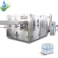 Ligne de remplissage et d'emballage automatique clé en main pour bouteilles d'eau en plastique à grande vitesse 32-32-8 (lavage, remplissage, rinçage)