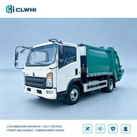 Camion compacteur de déchets HOWO 4x2 de 7000L, carrosserie verte, camion de collecte des ordures pour usage urbain, vente directe d'usine