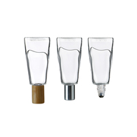 Vente en gros de flacons de parfum en verre transparent de 10 ml en forme de dentifrice avec bouchons à bille en bambou et en métal