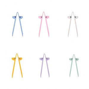 Anillo de dedo nuevo para palillos, para recoger bocadillos sin ensuciar las manos, auxiliar para juegos y para comer sin esfuerzo, venta al por mayor personalizada - Product Image 1