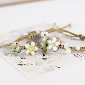 Bracelets rustiques faits main en corde cirée, style bohème, avec breloques florales en céramique (fleurs et feuilles) - Product Image 2