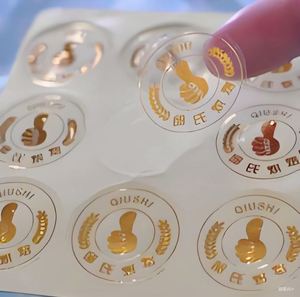 Wholesale Price Custom Printing PVC Waterproof Transparent <b>Stickers</b> with Gold Foil Embossing for Supermarket Use - Product Image 1