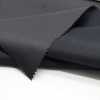 Tissu en peau de pêche tissé sergé avec revêtement en PU imperméable et coupe-vent 100% polyester poids moyen pour manteaux d'extérieur