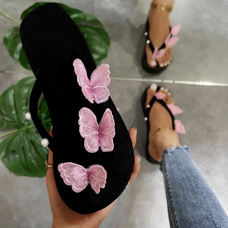 2023 new butterfly flip flop women's thick bottom slope heel pearl sandals summer large beach sandals