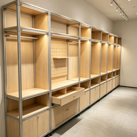 Vitrine en bois avec cadre en alliage d'aluminium de style industriel, dotée de tiroirs et d'étagères de rangement