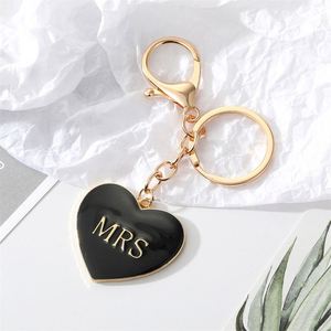 Llaveros de aleación ligeros para parejas, con dijes MR MRS, diseño circular sencillo, para bolso, regalos de San Valentín para amantes - Product Image 4