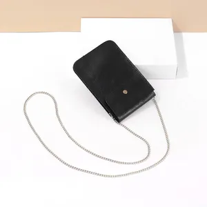 2021 new thin soft leather small bag zipper simple fashion mobile phone bag Europe and America simple leather hand bag diagonal