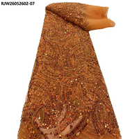 Tissu de dentelle en tulle français brodé de perles lourdes couleur orange brûlé, idéal pour les mariages nigériens et africains