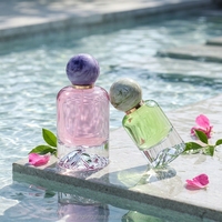 Flacon de parfum rond en verre de luxe de 30 ml, 50 ml, 100 ml avec couvercle en marbre et base en forme de montagne, flacon de parfum unique avec bouchon