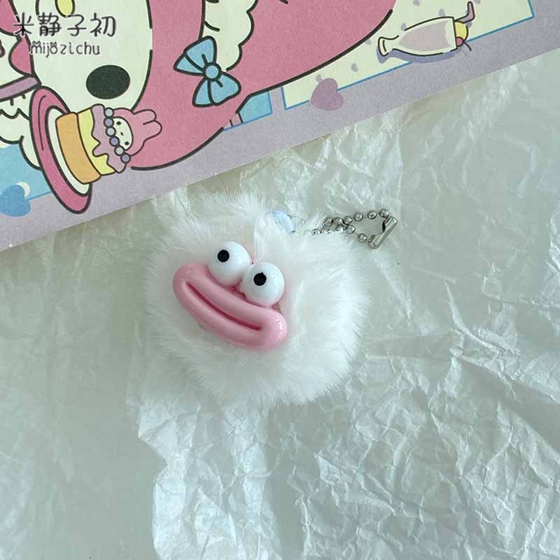 Porte-clés pompon bouche de saucisse blanche