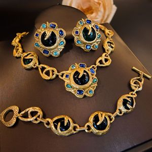 Ensemble de bijoux KAMMY personnalisé vintage en or 18 carats avec strass bleus et tournesol vert, collier et bracelet sur le thème des plantes - Product Image 1