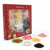 Kit cadeau de dessert sucré chaud avec des bouteilles en forme d'étoile, des pépites de menthe poivrée, des guimauves, du chocolat pour le café