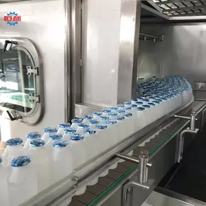 خط تعبئة الحليب آلة تعبئة مشروبات الطاقة السائل آلة تعبئة