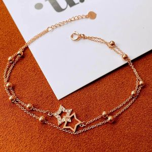 สร้อยข้อมือทองคำ 18K ประดับดาว ดีไซน์หรูหรา ประดับเพชรเม็ดเล็ก สองชั้น ยี่ห้อซินฟลาย ขายดี - Product Image 4