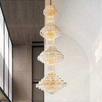 Lustre en cristal de luxe sur plusieurs niveaux, forme de tour dorée, luminaire suspendu en acier pour villa, hôtel, hall d'entrée, escalier