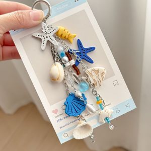 Porte-clés Étoile de <span class=keywords><strong>Mer</strong></span> Série Océan, Pendentif Thème Vie Nautique Plage, Breloque Scintillante Étoile de <span class=keywords><strong>Mer</strong></span> pour Sac et Accessoire à Suspendre au Rétroviseur de Voiture - Product Image 1