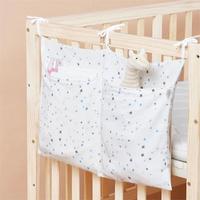 Quantité minimale de commande bas haute qualité mousseline bébé sac de rangement suspendu 100% coton pépinière berceau organisateur jouet couches pochette de rangement