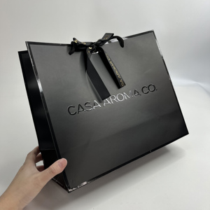 Wholesale High Quality Black Paper Bags with UV Spot Border & Embossed Logo with Ribbon Bow - Premium Shopping Bags - Product Image 1