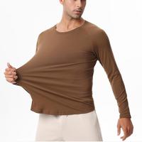T-shirt de sport respirant et écologique à manches longues pour homme, coupe classique, en coton et élasthanne, séchage rapide, idéal pour l'entraînement et comme sous-vêtement technique.