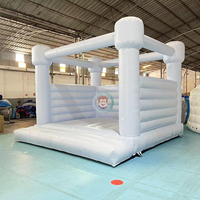 Château gonflable commercial en PVC bleu ciel avec toboggan pour enfants, idéal pour les fêtes de mariage en extérieur