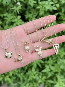 Joyería con diseño de animales: collar con dijes de pez, colibrí y conejo, y dije de corazón para mujer - Product Image 1
