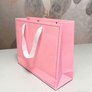 Factory Price Paper <b>Bag</b> Custom Printed logo Luxury Clothing Shopping Underwear Boutique Recyclable Gift <b>Bag</b> With Ribbon Rope - Product Image 1