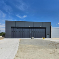 Hangar d'avion en structure métallique personnalisée, entrepôt préfabriqué en métal, conception de bâtiments métalliques pour un projet réel en Pologne
