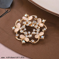 Broche de mode pour femme, ornée de strass effet diamant et de pierres œil de chat en forme de fleur, pour corsage et revers, accessoires vestimentaires