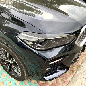 BMW X5 X6 G05 G06 2019+ สติ๊กเกอร์ตกแต่งคิ้วไฟหน้า สีดำเปียโน ABS สติ๊กเกอร์ติดตัวถัง - Product Image 3