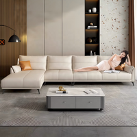 Canapé d'angle moderne en cuir véritable crème avec coussins confortables pour un salon luxueux