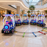 Train à pédales pour enfants de style britannique avec piste circulaire détachable et lumières LED pour 5 à 10 passagers