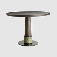Table à manger ronde en cuir réglable de style américain, moderne et luxueuse, avec taille et couleur personnalisables pour la maison, l'hôtellerie et l'ameublement.