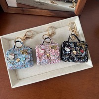 Nouvelle Pochette Portable pour Écouteurs en Forme de Tête de Chat de Dessin Animé, Pendentif Porte-clés Polyvalent Tendance, Breloque de Sac Accessoire pour Filles en Promotion