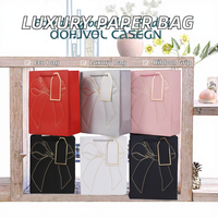 Sac en papier blanc de luxe avec gaufrage, estampage à chaud et impression offset |   Recyclable