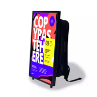 Mochila de 32 pulgadas LCD Digital Walker Billboard Pantalla LED Walking Billboard Human Walking Publicidad Billboard School Bag