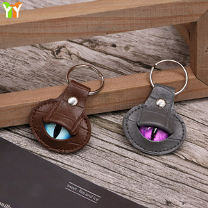 European and American cross-border evil eye <b>keychain</b> PU <b>leather</b> vertical pupil <b>keychain</b> pendant personalized key ring small gift - Product Image 2