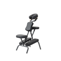 Fauteuil de massage pliant portable en gros, noir, en PU, avec cadre métallique, appui-tête, accoudoirs et coussin de poitrine, pour spa, OEM